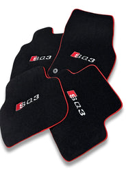 Tapis de sol de voiture en moquette de luxe compatibles avec Audi | Conviennent aux modèles Q3 / RSQ3 | Sur mesure, logo brodé et fabriqués à la commande | Bordure rouge